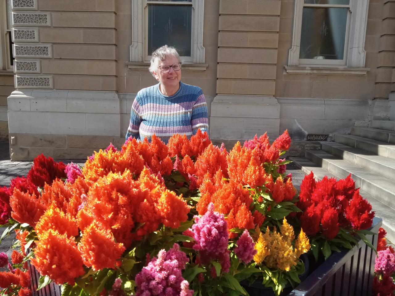 Hobart--morning-walk-Martha-with-flowers-in-front-of-city-hall-2.jpg